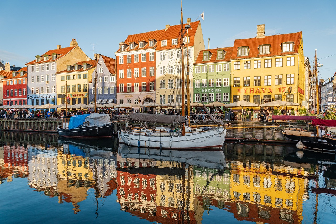 Flights to Copenhagen (CPH) - Nyhavn colorful harbor - book airline tickets