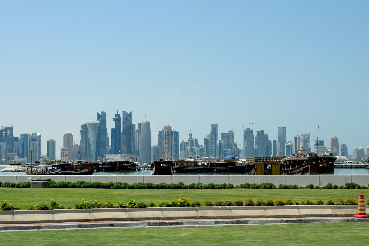 Flights to Doha (DOH) - Doha modern skyline - book airline tickets