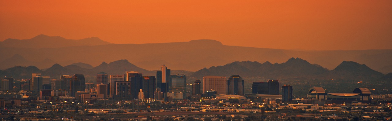 Flights to Phoenix (PHX) - Phoenix desert cityscape - book airline tickets